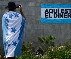 <i>Los hondureños han pedido en varias ocasiones acciones claras para evitar la corrupción a todo nivel en el país. Foto ORLANDO SIERRA / AFP</i>